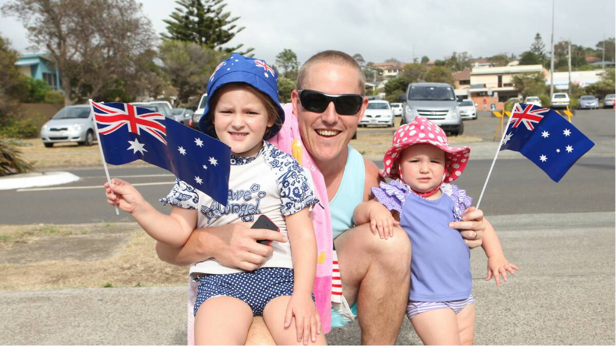 Anthony Hourigan with his daughters Isabelle, 4, and Emily, 1, celebrate Australia Day at Kiama. Picture: Dylan Robinson