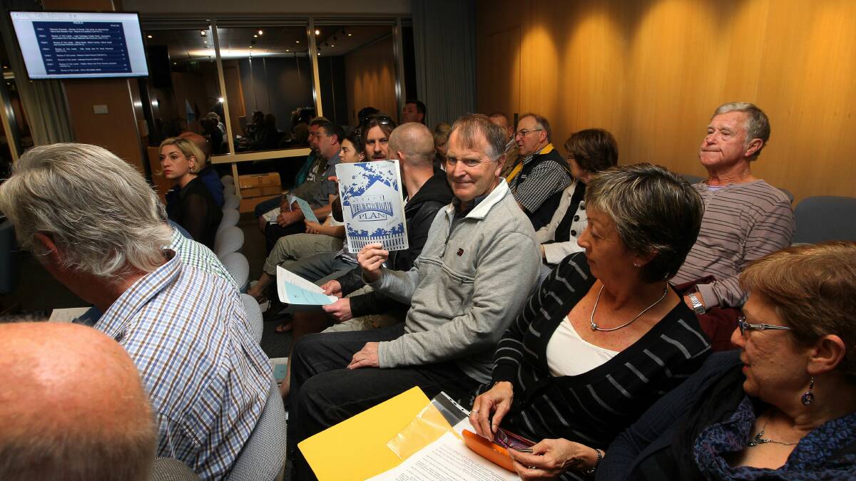 Some Helensburgh landowners, including Bruce Benett, were at the Wollongong City Council public gallery to hear the council's rezoning decision. Picture: SYLVIA LIBER