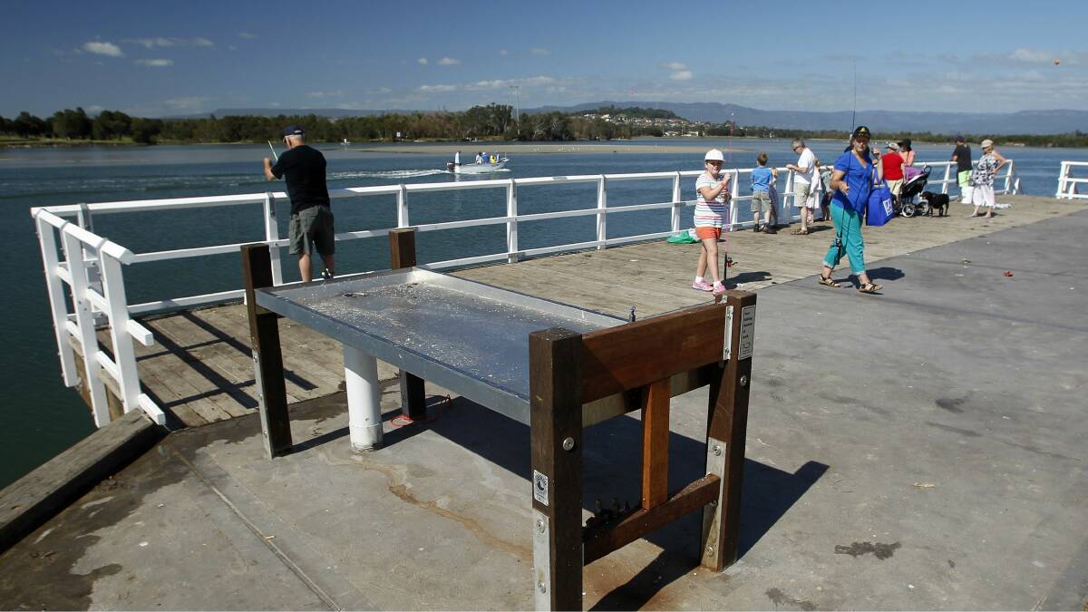 The new fishing platform and fish-cleaning table at Windang are proving popular. Picture: ANDY ZAKELI