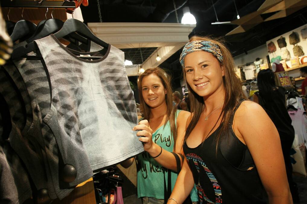 Twins Michalie and Kobie Klein, of Flinders, shopping at Parliament Clothing. Pictures: DAVE TEASE