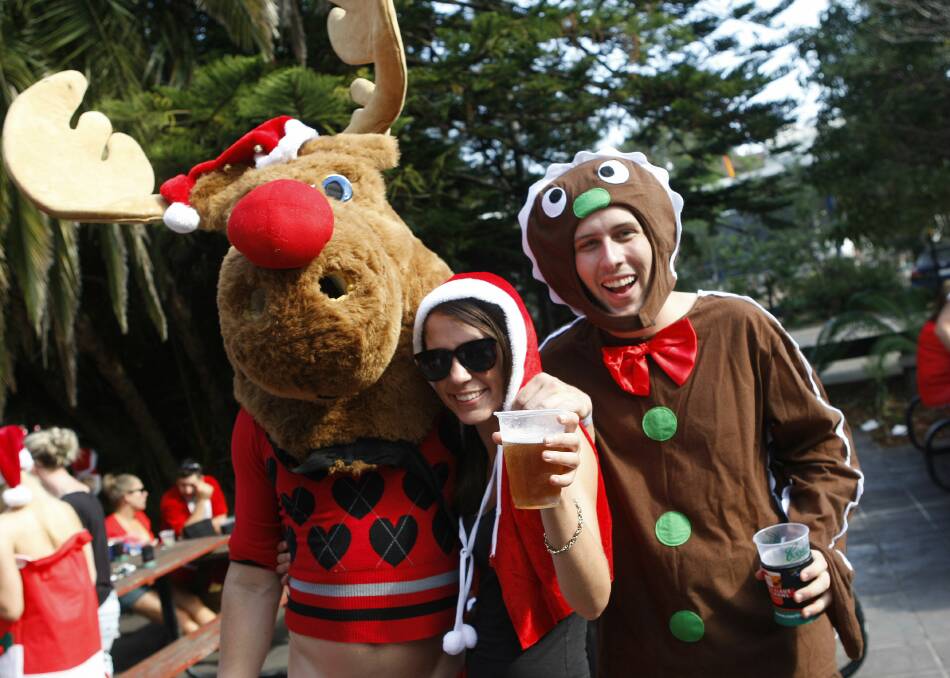 Revellers at the Santa Claus Pub Crawl for Charity at the North Wollongong Hotel. Picture: ANDY ZAKELI