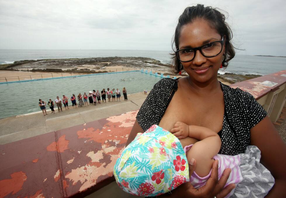 Tanya Demello with daughter Ariah, 6 months, at Woonona Beach rock pool. Picture: ROBERT PEET