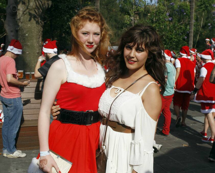 Revellers at the Santa Claus Pub Crawl for Charity at the North Wollongong Hotel. Picture: ANDY ZAKELI