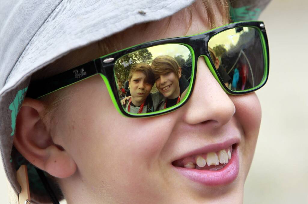 1st Dapto's Dale Cunningham and Owen Crawford are reflected in the sunglasses worn by Liam Lambert. Picture: ANDY ZAKELI