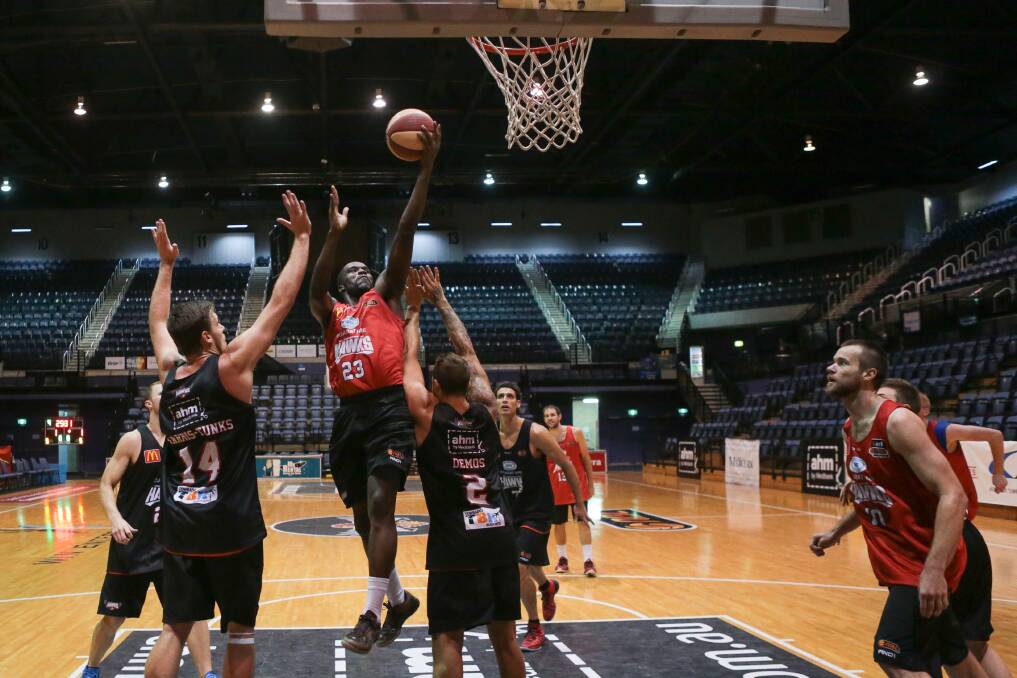 Hawks import Kevin Tiggs makes a lay-up during Monday’s training session at WIN Entertainment Centre. Picture: ADAM McLEAN