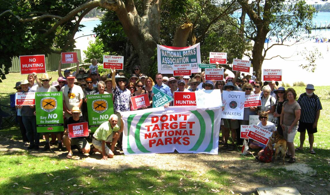 Protestors gathered at Bundeena last month to rally against plans to allow amateur hunters in NSW National Parks