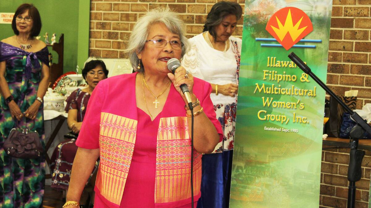 Illawarra Filipino Multicultural Women's Group's Lilia McKinnon opening the Antiques and Collectables Fair.