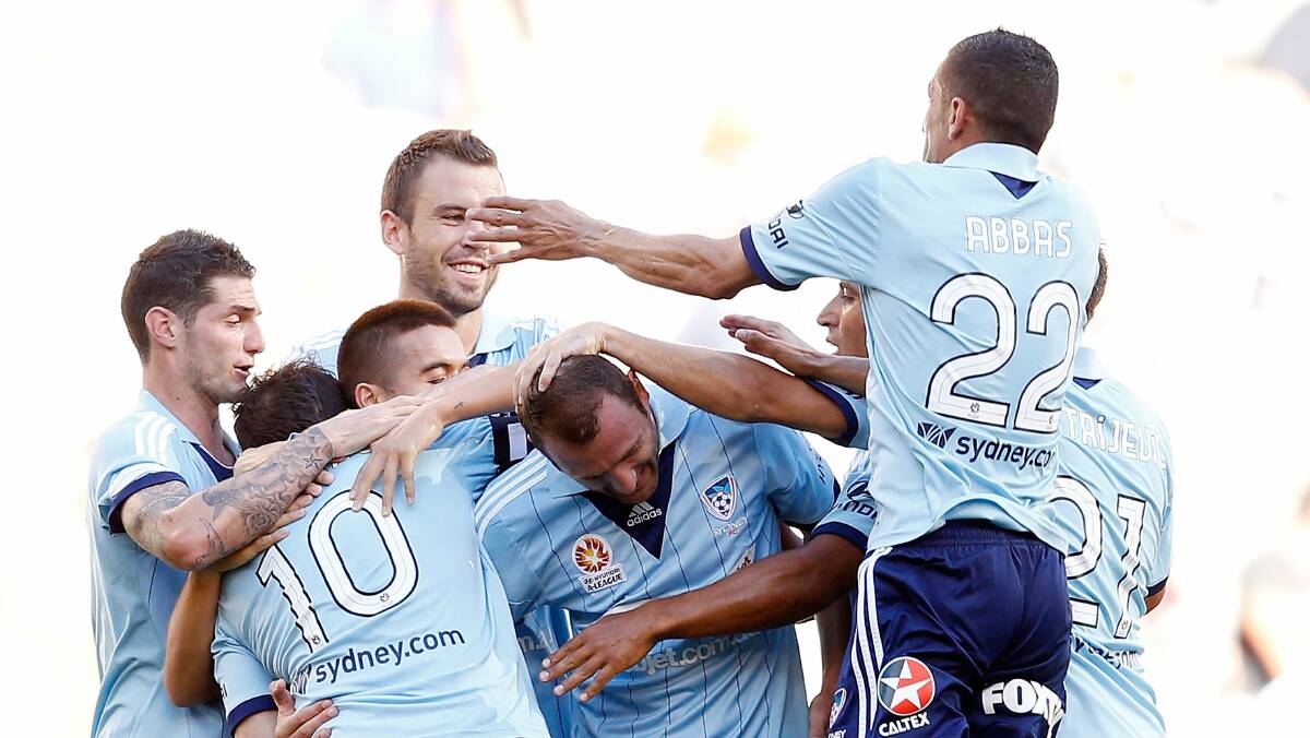 Sydney FC's Alessandro Del Piero (10) is congratulated by teammates after scoring his second goal against Melbourne Victory. Picture: GETTY IMAGES