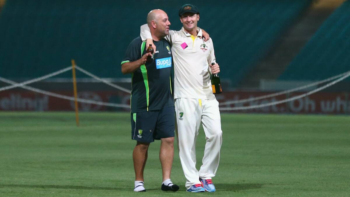 Coach Darren Lehmann and captain Michael Clarke celebrate the Ashes whitewash. Picture: GETTY IMAGES