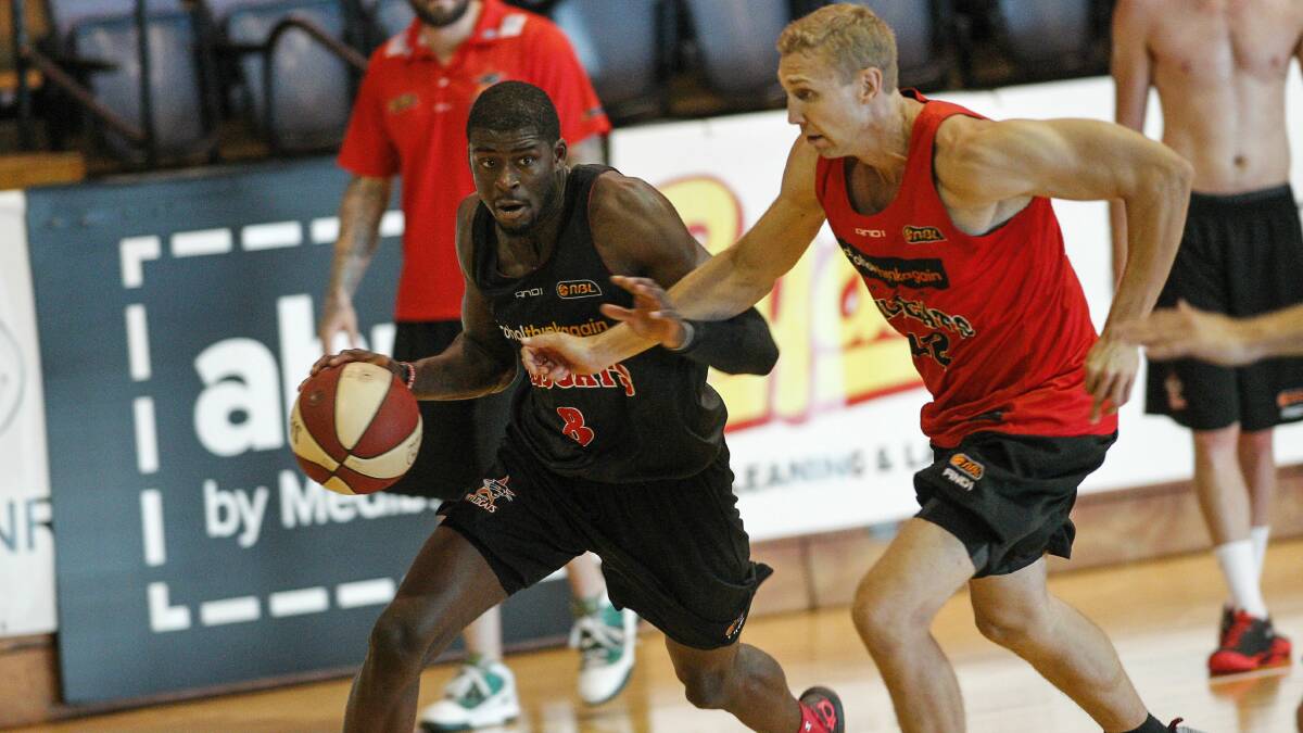 US import James Ennis (left)  trains with the Wildcats yesterday at the WEC. Picture: CHRISTOPHER CHAN