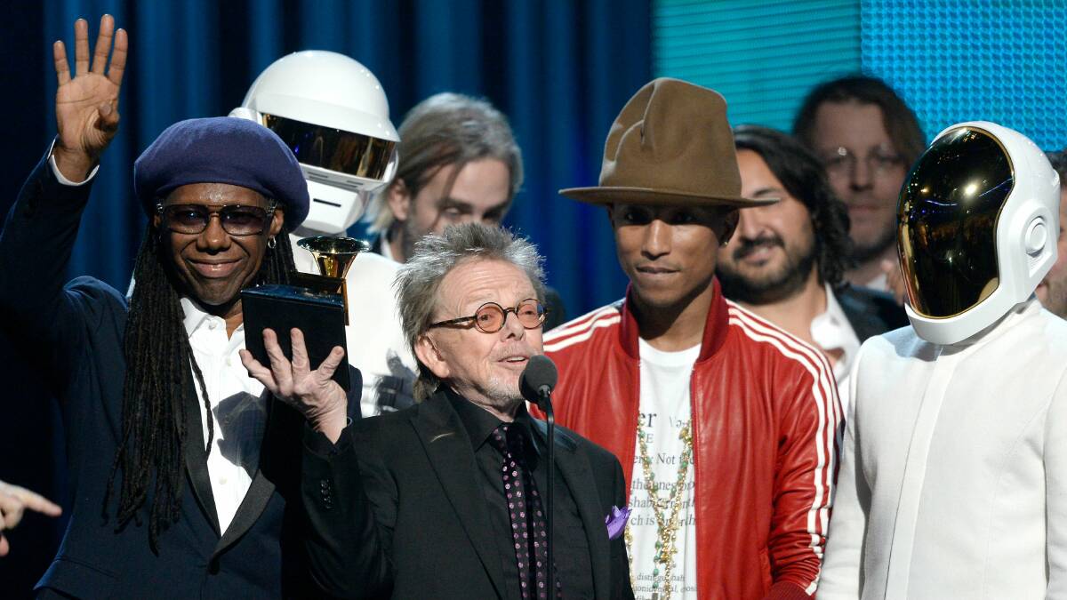 Daft Punk accept the Album of the Year award. Picture: GETTY IMAGES