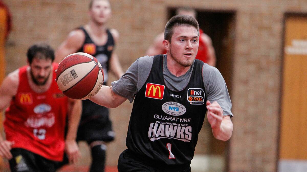 Rotnei Clarke, at Hawks training, is looking forward to more game time with Kevin Tiggs.