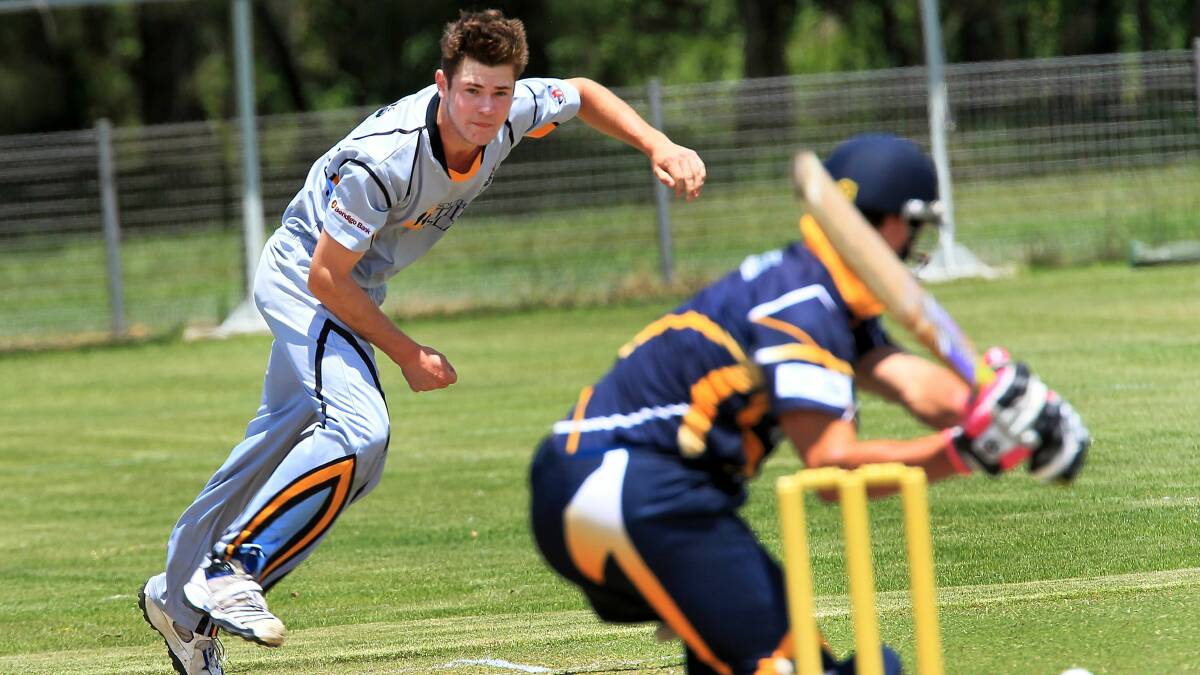 The South Coast competition's leading batsman, Lake Illawarra opener Kerrod White, on the attack against Oak Flats fast bowler Joel Gray. Picture: ORLANDO CHIODO