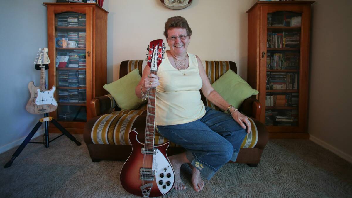 Joan Ingram, of Dapto, with her Rickenbacker guitar which she lent to The Searchers for the last show of their Australia tour after their 12-string guitar was damaged. Picture: ADAM McLEAN