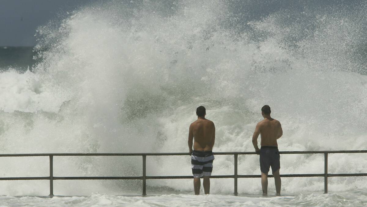 Wild waves at Austinmer yesterday. The beach is one of 14 closed in Wollongong today. Picture: DAVE TEASE
