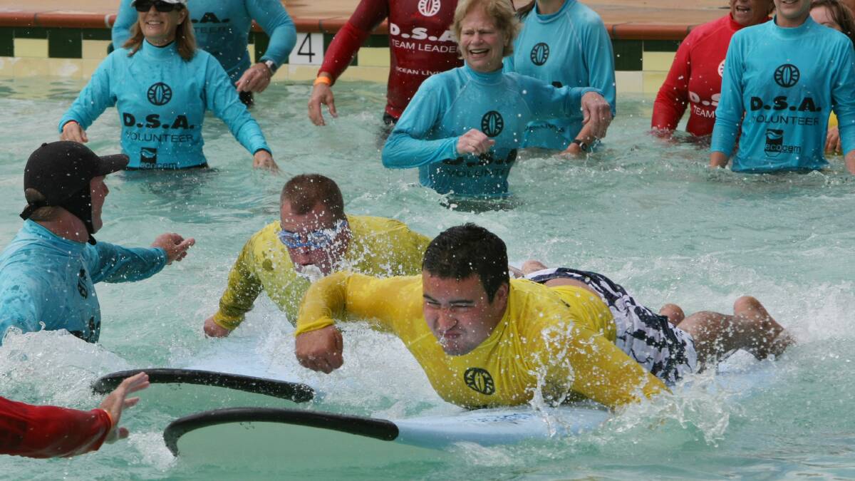 GALLERY: Disabled surfers dive into summer