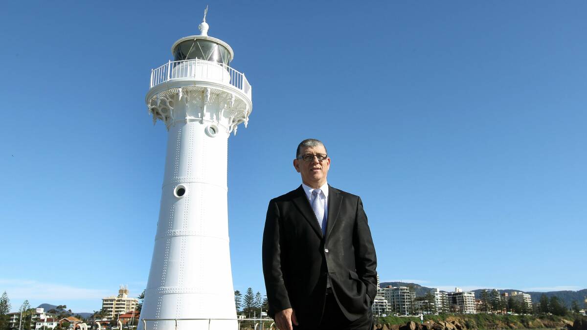 Minister for the Illawarra John Ajaka walks near the old Wollongong Lighthouse. Picture: SYLVIA LIBER