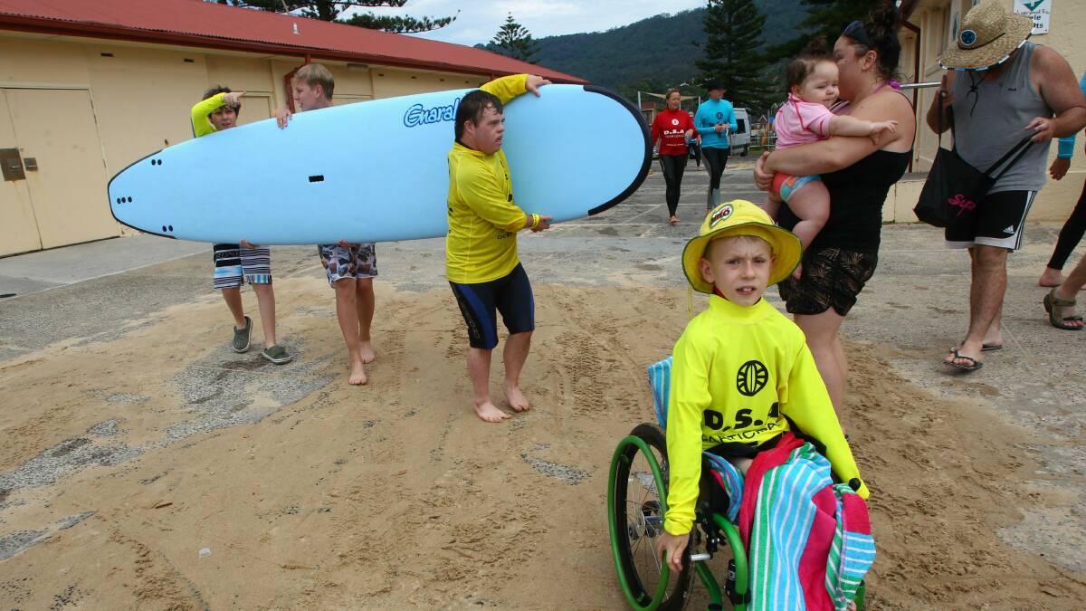 GALLERY: Disabled surfers dive into summer