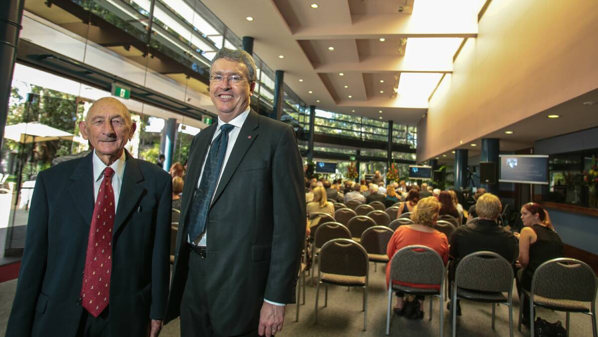  Vice-Chancellor Paul Wellings (right) and Professor John Mulvaney at the memorial service. Pictures: Adam McLean