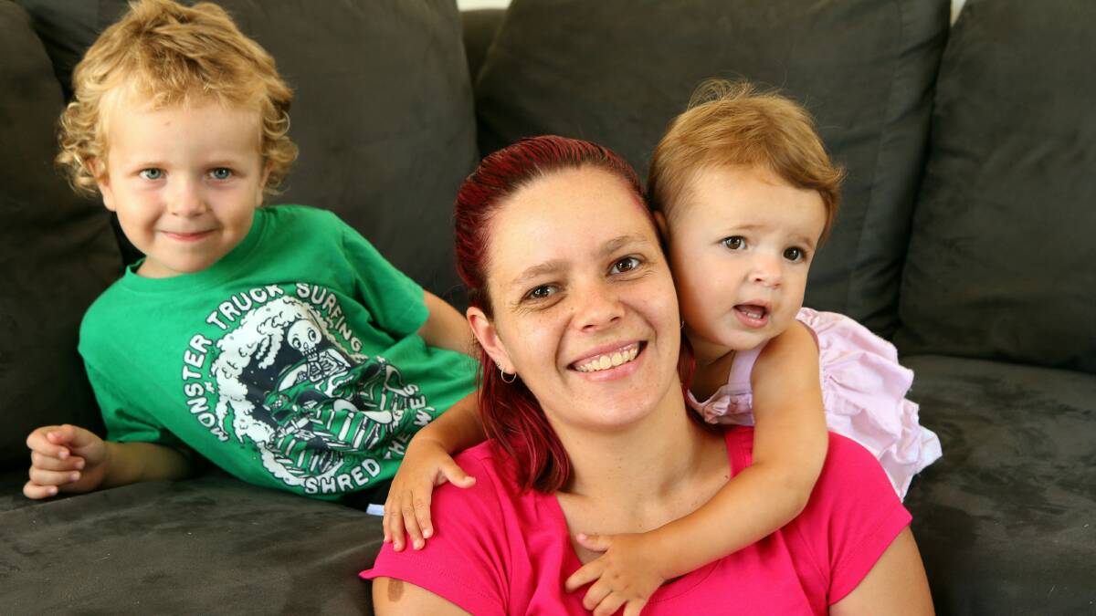 Jamie-Lee Hall, of Woonona, with her children Mark, 3, and Maddison, 18 months. Picture: KIRK GILMOUR
