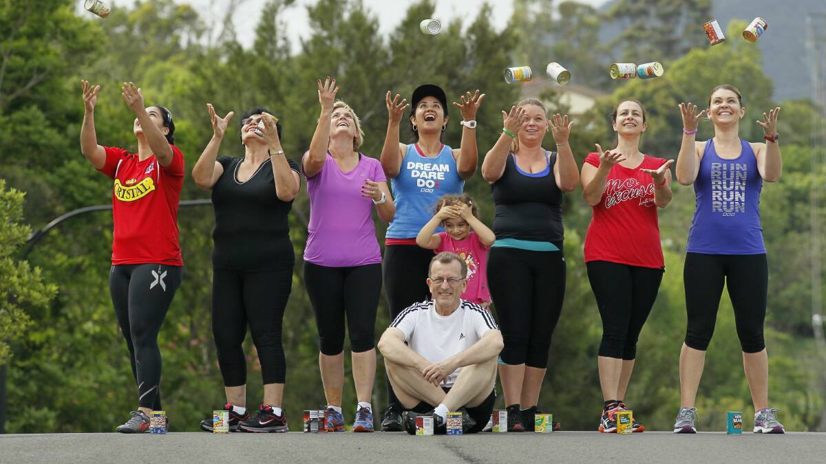 Linda Munoz (centre) with other participants in the Can the Kilos initiative. Picture: DAVE TEASE