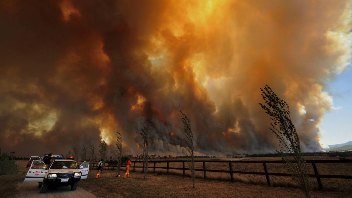 A bushfire rages in regional Victoria on Black Saturday in 2009. Picture: JASON SOUTH