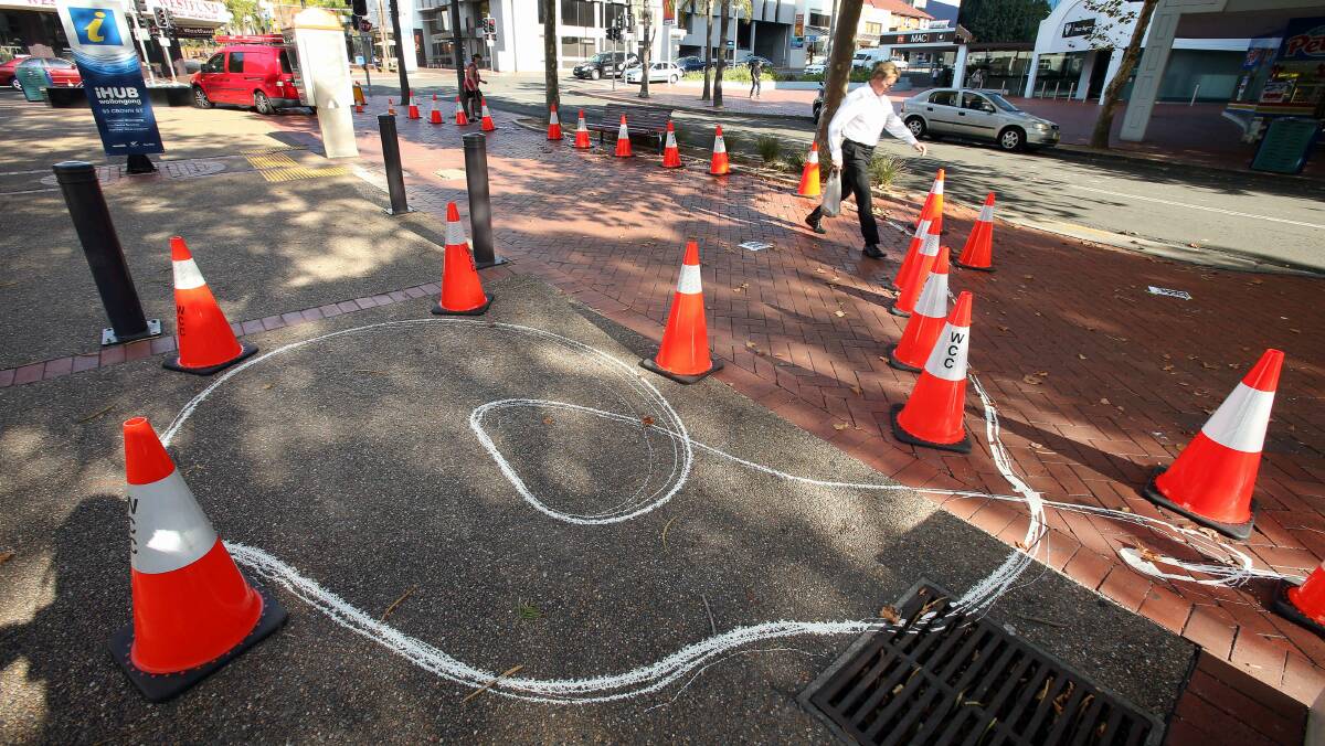 Vandals left a trail of white paint throughout Wollongong's CBD. Picture: KIRK GILMOUR 