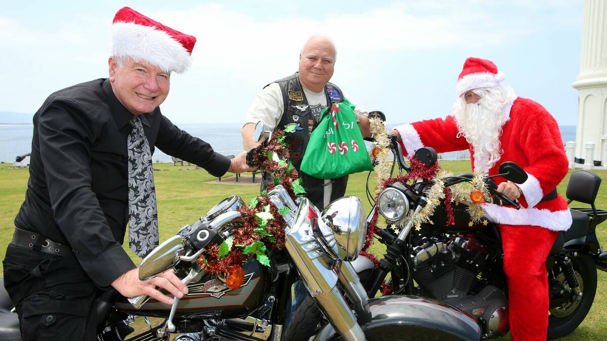 Mayor Gordon Bradbery with biker Jeff Rice and Santa. Picture: KIRK GILMOUR