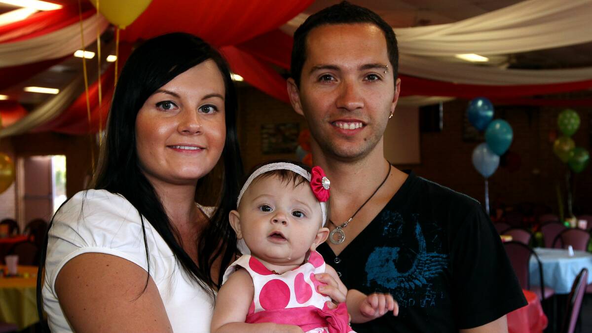 Natalie Chapman and Michael Abreu with their daughter Ella Abreu. Picture: SYLVIA LIBER