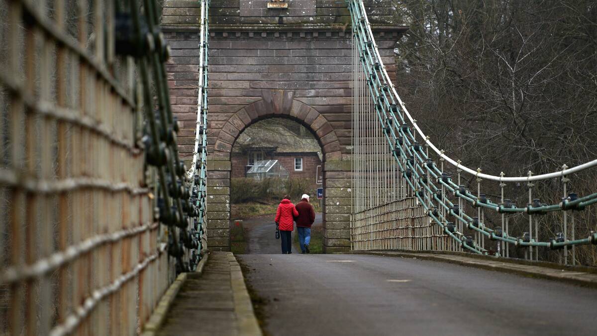 People cross the Union Bridge, which connects England and Scotland. Picture: GETTY IMAGES