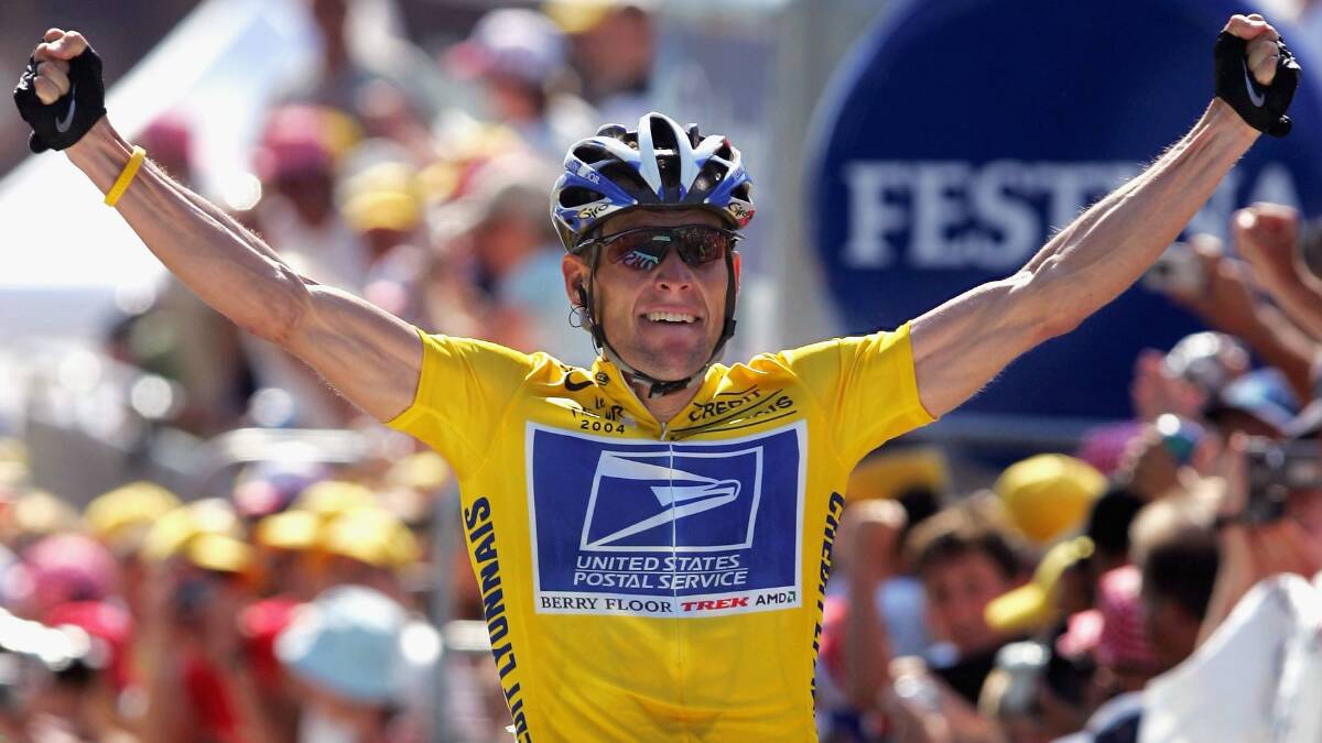 Lance Armstrong celebrates during the 2004 Tour de France. Picture: GETTY IMAGES