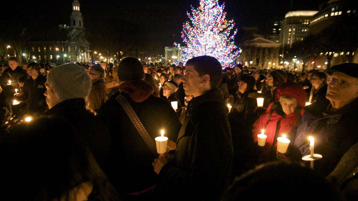 Hundreds gather for a candlelight vigil in New Haven, Connecticut. Picture: REUTERS