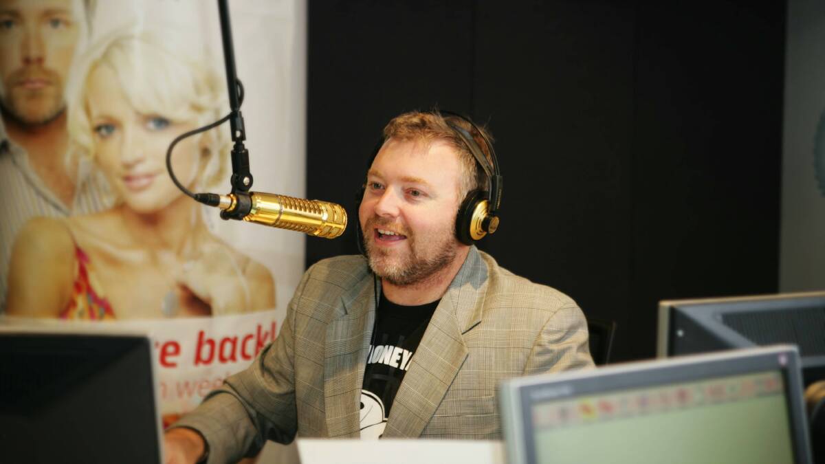 Radio host Kyle Sandilands in the studio. Picture: QUENTIN JONES