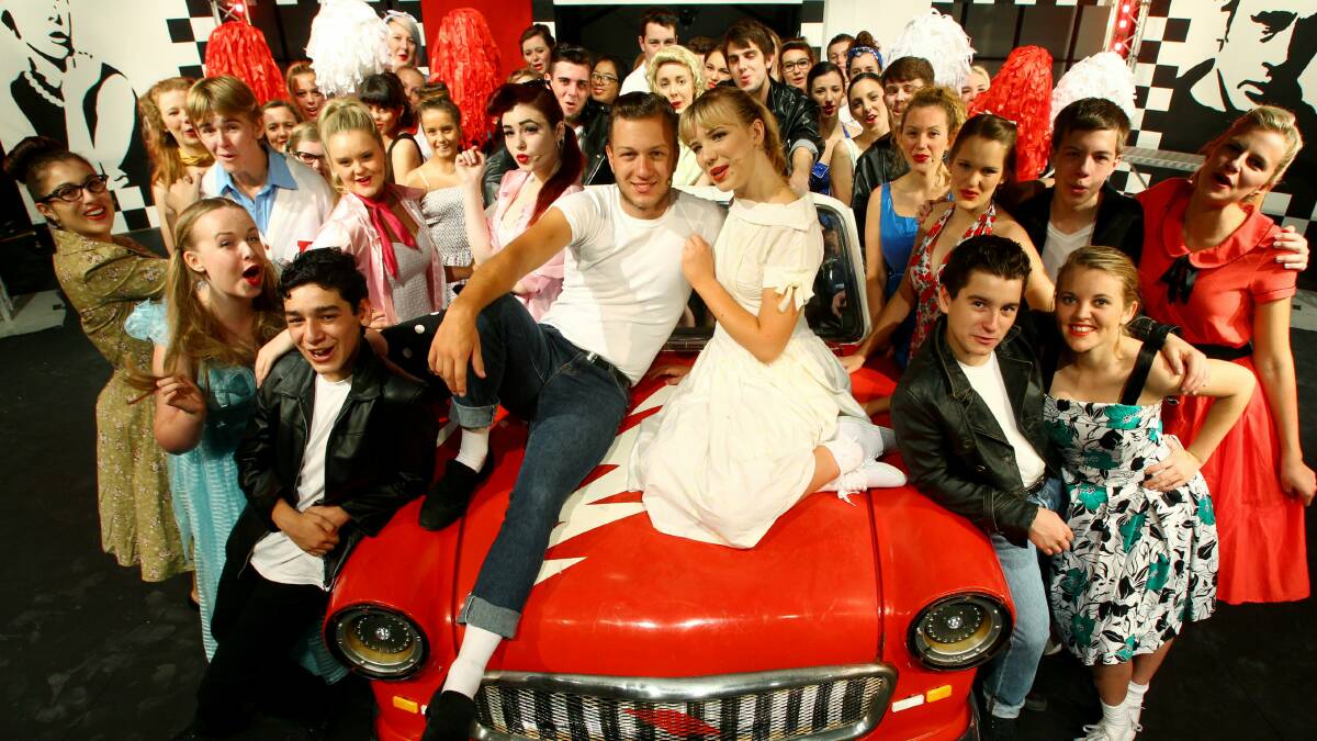 Cast members of the production of Grease. Picture: KEN ROBERTSON