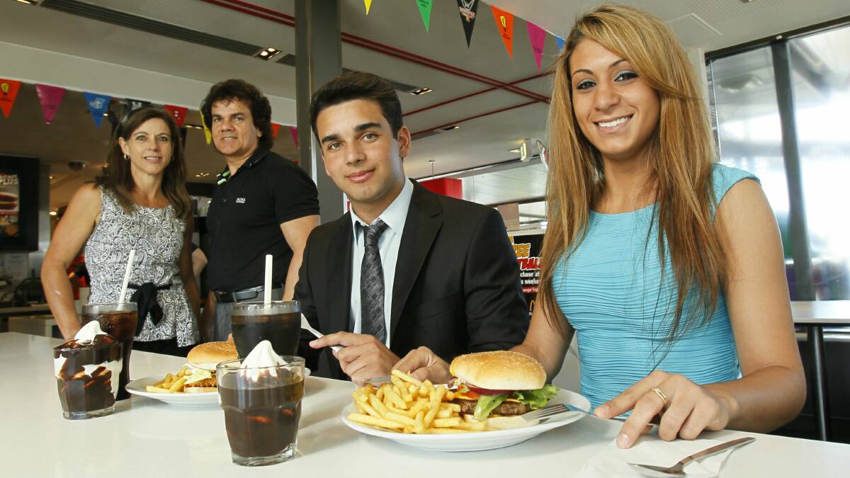 Katia and Glenn Dwarte help James Dwarte and Renee Rodrigues dine in style at Warilla. Picture: DAVE TEASE