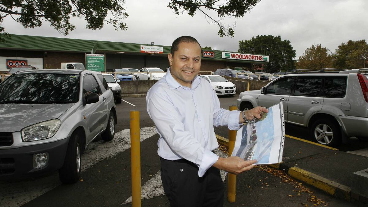 Design Workshop Australia director Robert Gizzi with plans for the redevelopment. Picture: ANDY ZAKELI