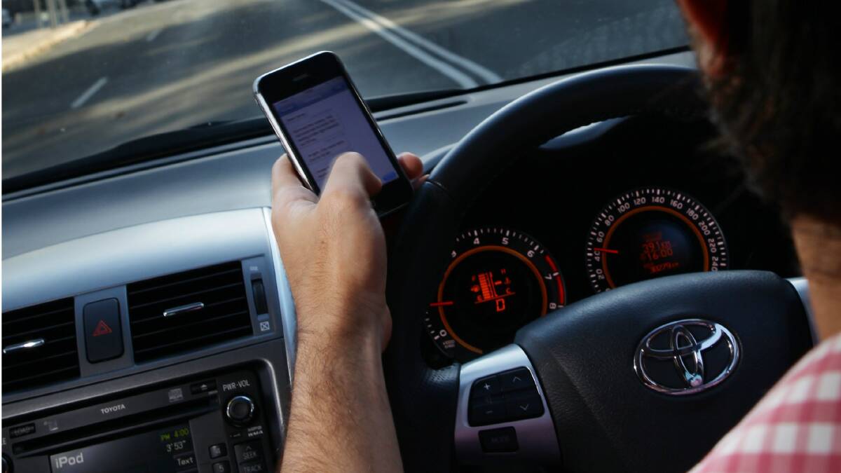 780 drivers caught under new phone laws