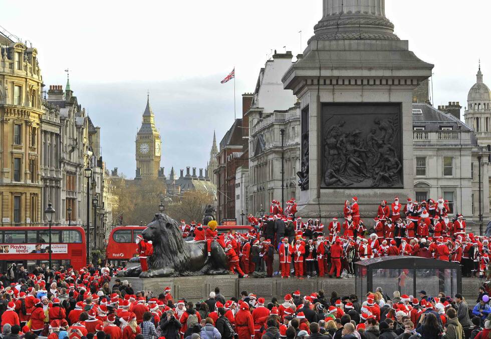 Revellers in Trafalgar Square in London. Picture: REUTERS