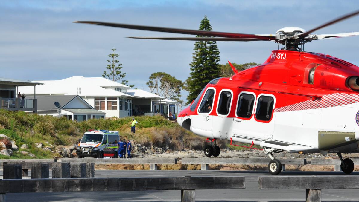Emergency services at Currarong boat ramp this morning. Picture: ADAM WRIGHT