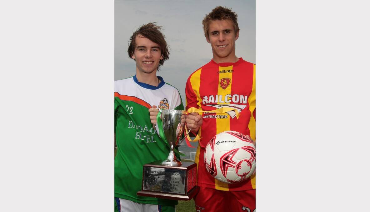 Dapto Dandaloo captain Jake Powell  with Wollongong United captain Mark Every. Picture: GREG TOTMAN