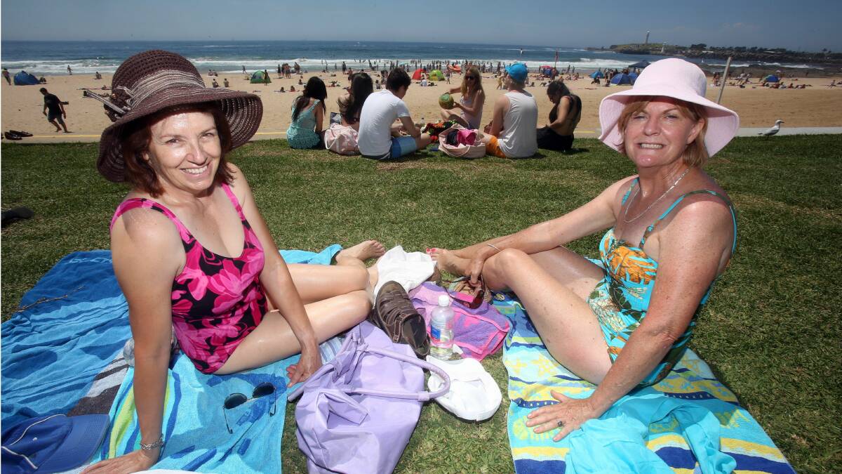 Sue Smith and Maureen Cornock from Camden relax at North Beach. Picture: ROBERT PEET