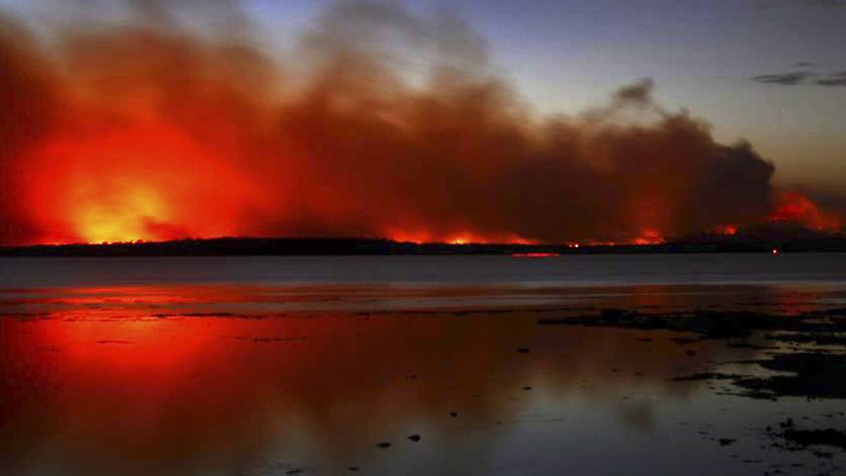 The Deans Gap bushfire burns at Sussex Inlet in January. Picture: NSW RFS