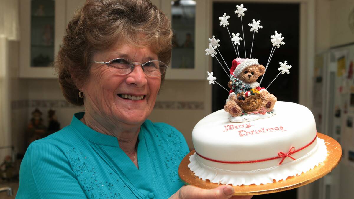 Phyliss Blissett with one of her award-winning fruit cakes. Picture: GREG TOTMAN