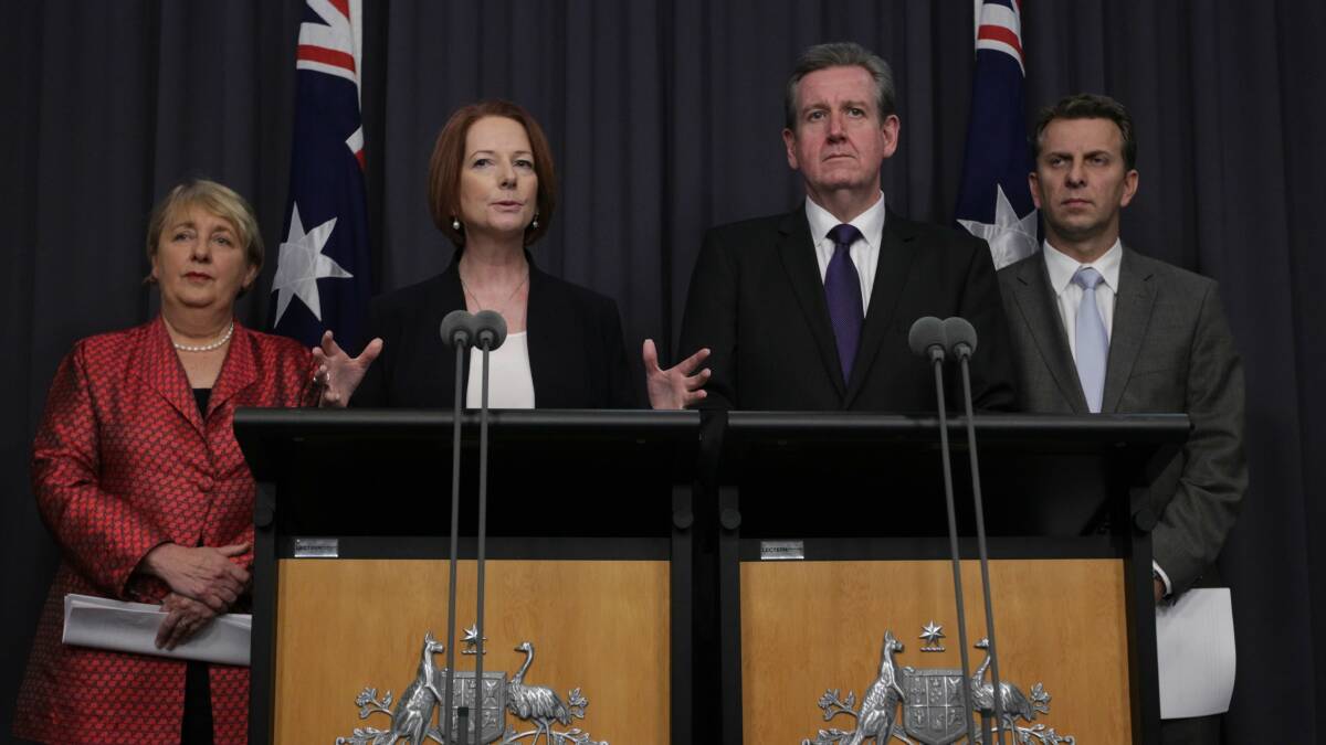 Disability Reform Minister Jenny Macklin, Prime Minister Julia Gillard, NSW Premier Barry O'Farrell and NSW Disability Services Minister Andrew Constance at the NDIS announcement. Picture: Alex Ellinghausen