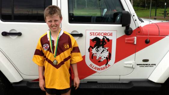 Ashton Thurgate: Rugby league, playing for St Therese West Wollongong primary school. 