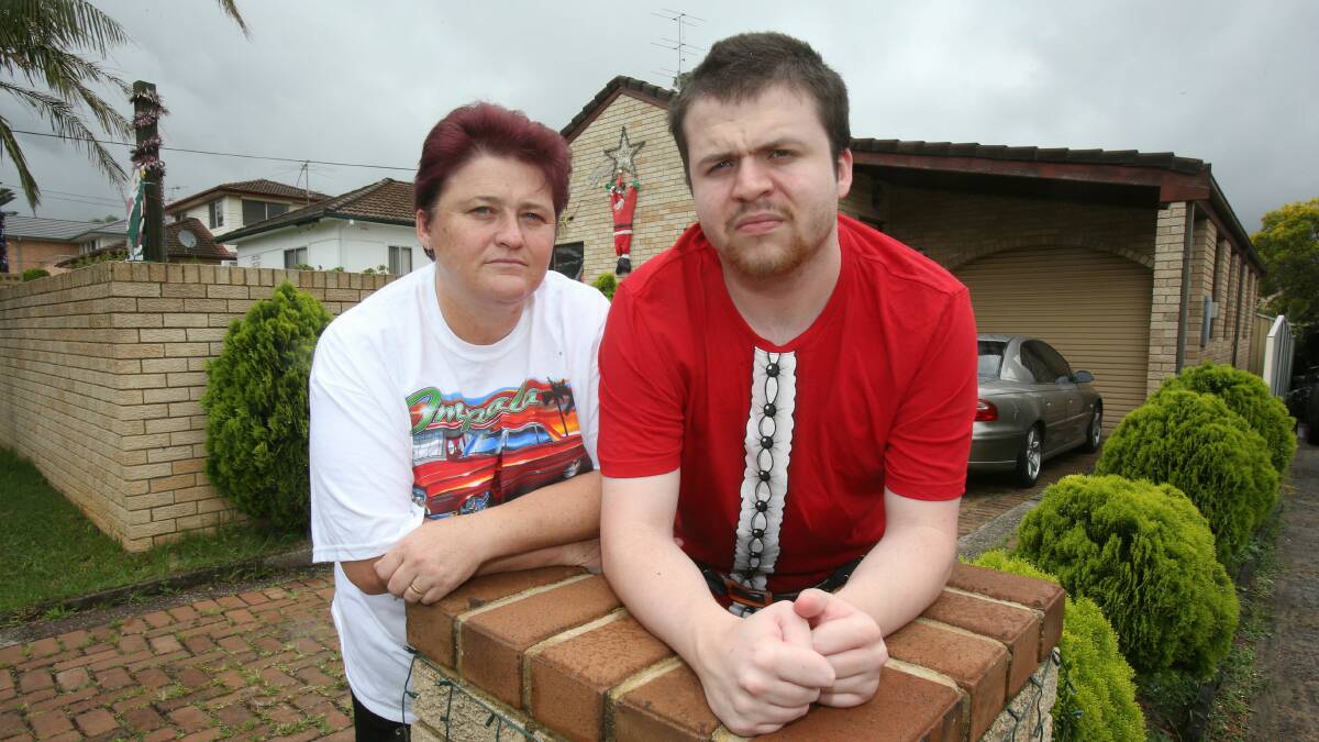  Kris Rice with her son, Stephen, had their Christmas lights stolen. Picture: ADAM McLEAN