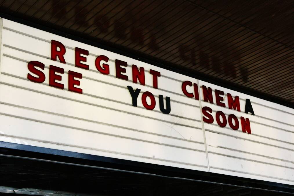 The Regent Theatre's final farewell: the illuminated letters on the marquee spell out the simple message ''See you soon''.