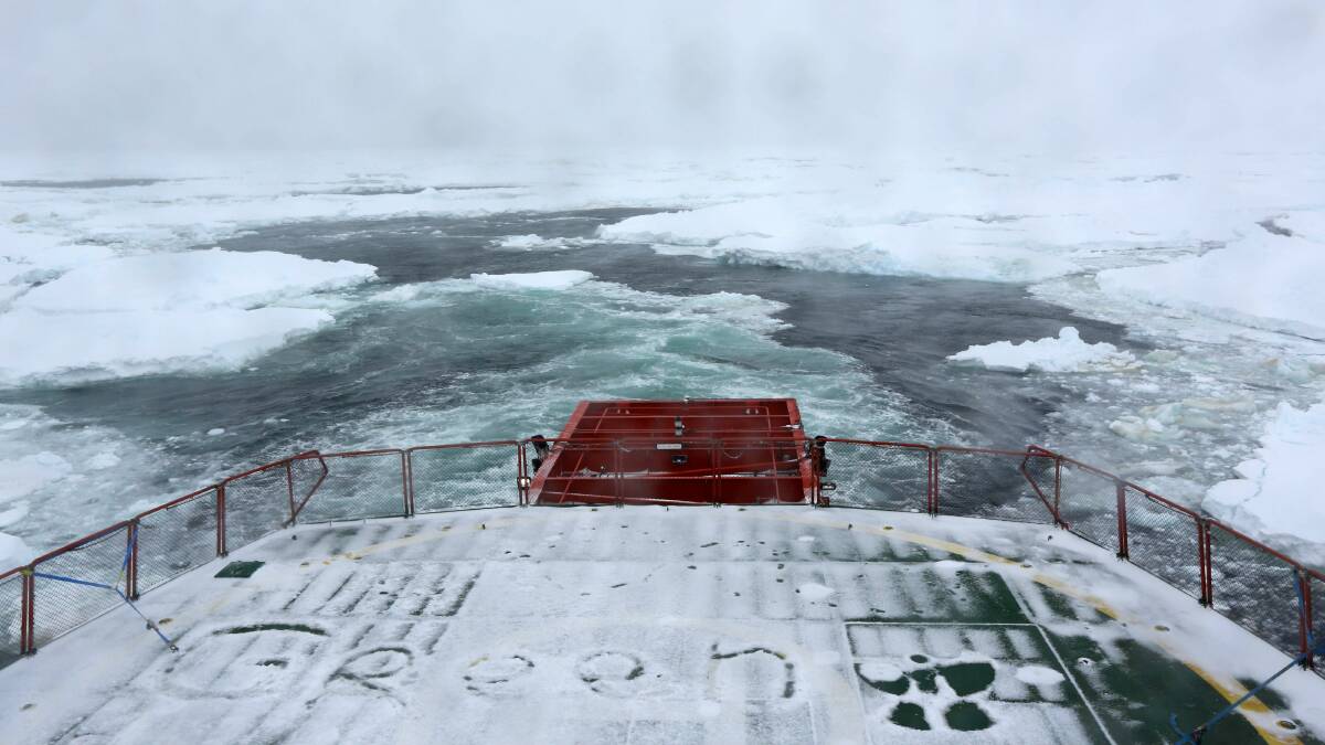 A view from the stern of the Aurora Australis as it punches its way through sea ice towards Shokalskiy. Picture: Colin Cosier 