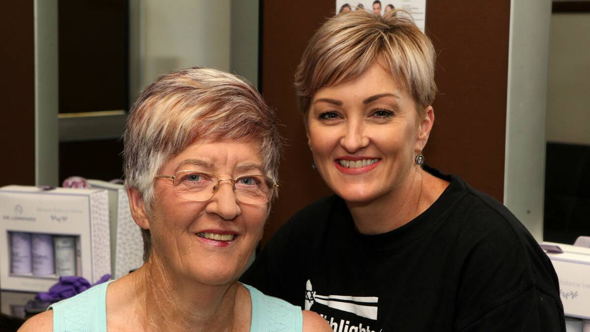Lynne Hutton pictured with Paula Reali, of Envy Hair Gallery. Picture: GREG TOTMAN