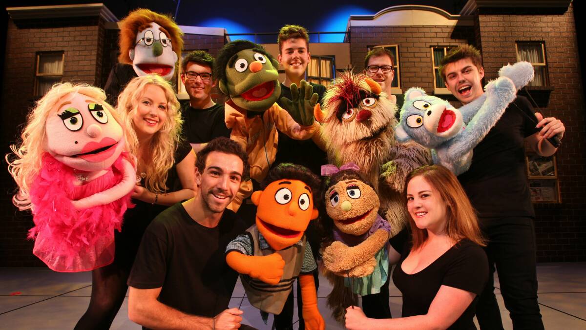 The cast of adults-only Sesame Street parody, Avenue Q which won best musical, and best director of a musical for Amy Copeland.  